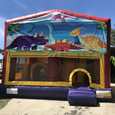 Hire CARTOON DINOSAURS JUMPING CASTLE WITH SLIDE, in Doonside, NSW