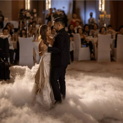 A couple dancing at their wedding.