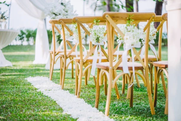 White Wooden Wedding Chair with flowers you can find on Gecko